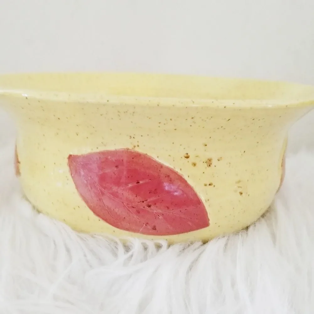Pottery mixing bowl leaf pattern.